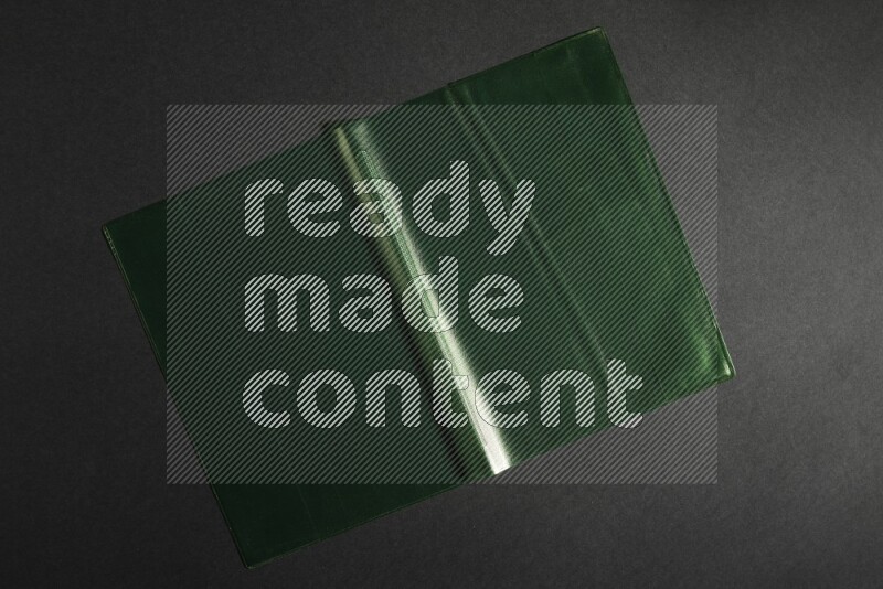 Colored plastic textures on black background