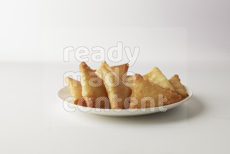 sambosas on a white background