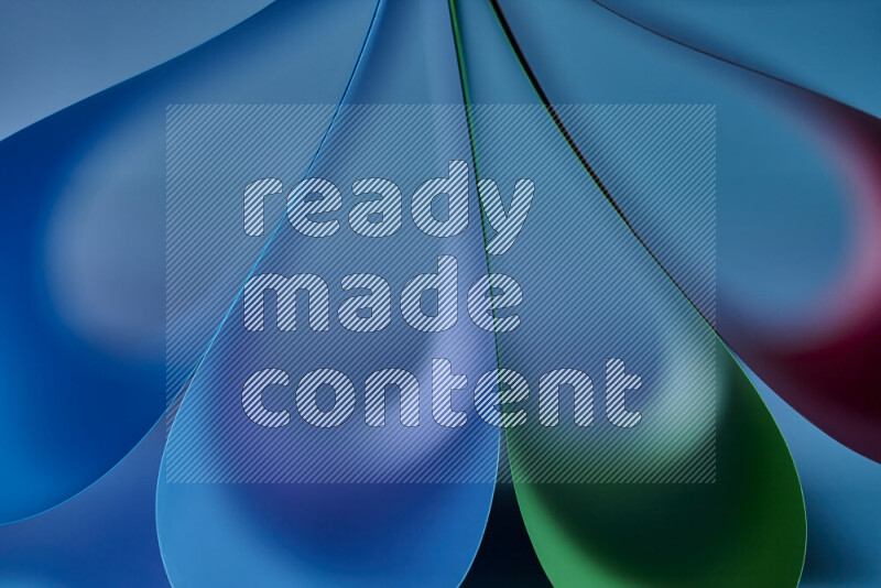 An abstract art piece displaying smooth curves in colorful gradients created by colored light