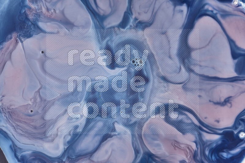 لقطة مقربة لأنماط دوامية باللون الأزرق والأحمر والأبيض