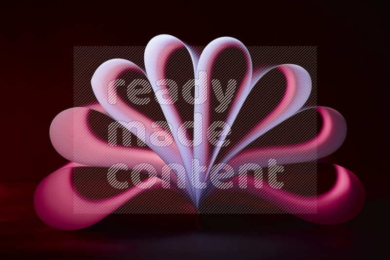 An abstract art piece displaying smooth curves in pink and purple gradients created by colored light