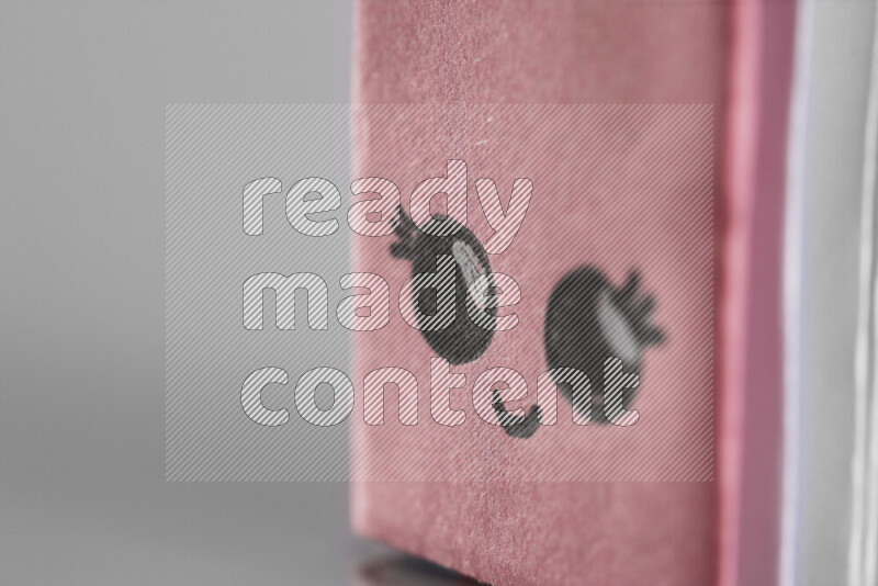 Origami book on grey background