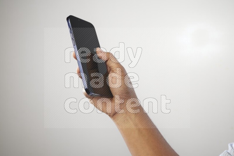 Male hand holding Smart phone on White background