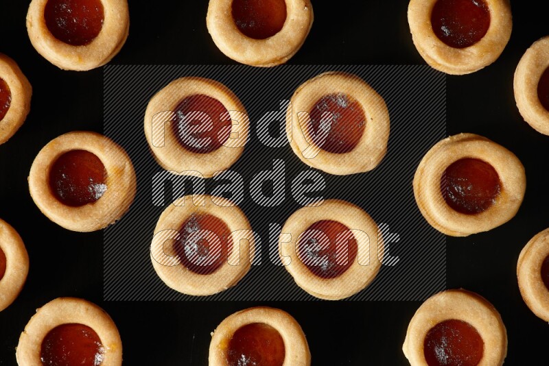 Jam cookies on a black background