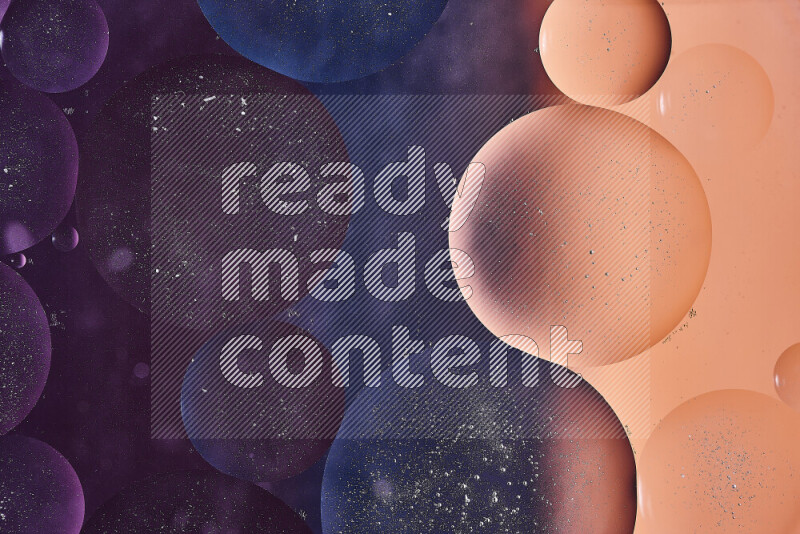 Close-ups of abstract oil bubbles on water surface in shades of blue, orange and purple