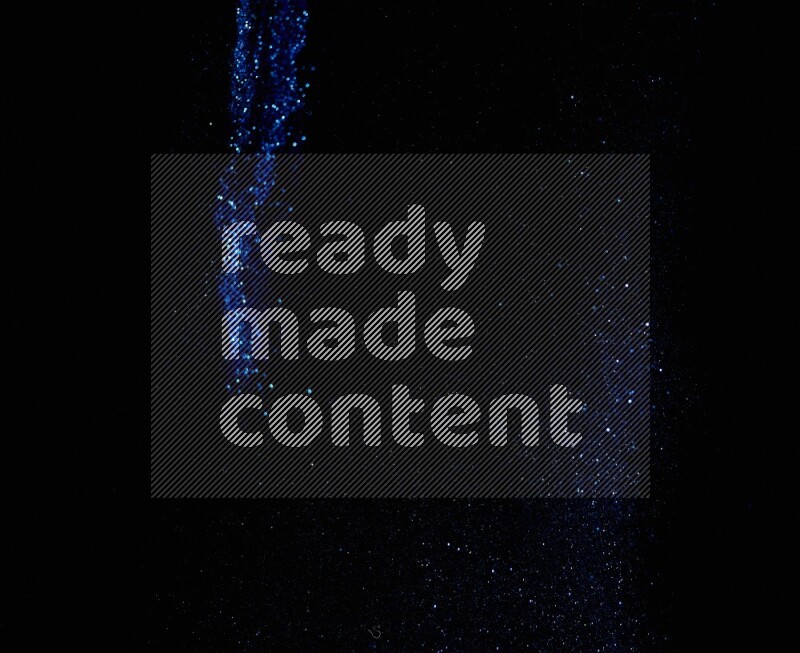 Blue glitter powder isolated on black background