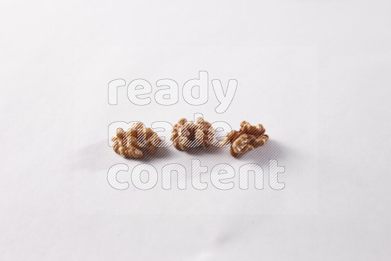 Walnuts on white background
