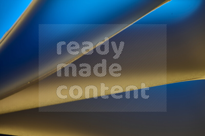 An abstract art piece displaying smooth curves in warm and cold gradients created by colored light