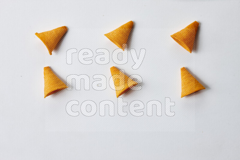 Assorted snacks on white background