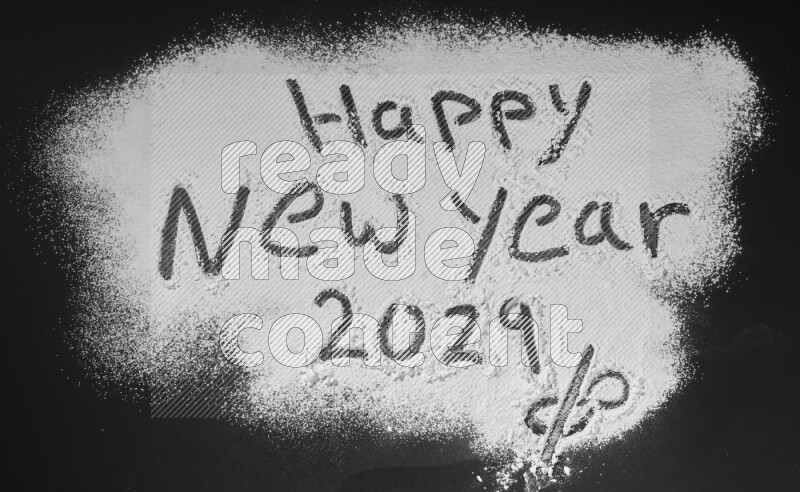 A sentence written with powder on black background