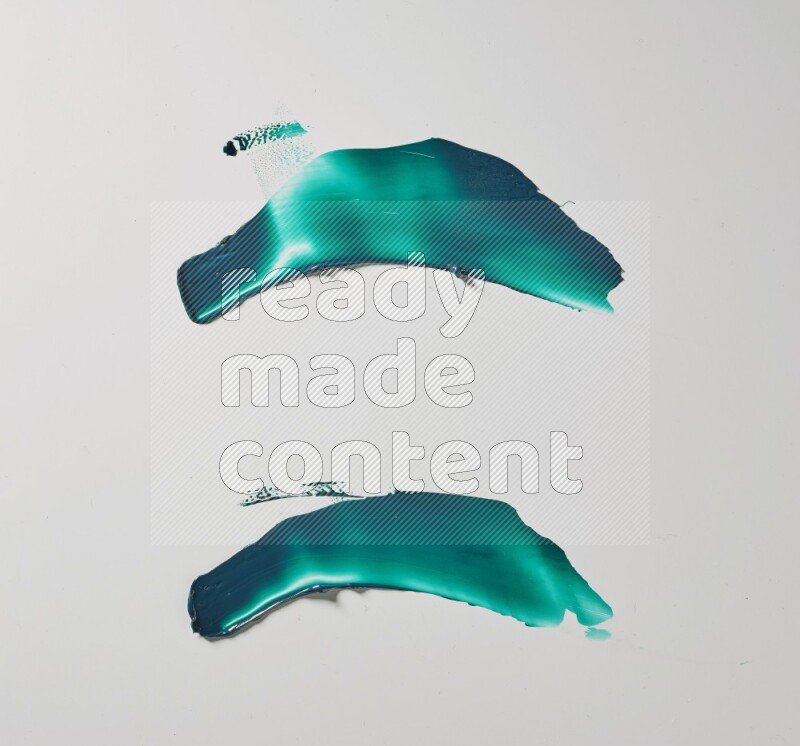 Turquoise curved painting knife strokes on white background