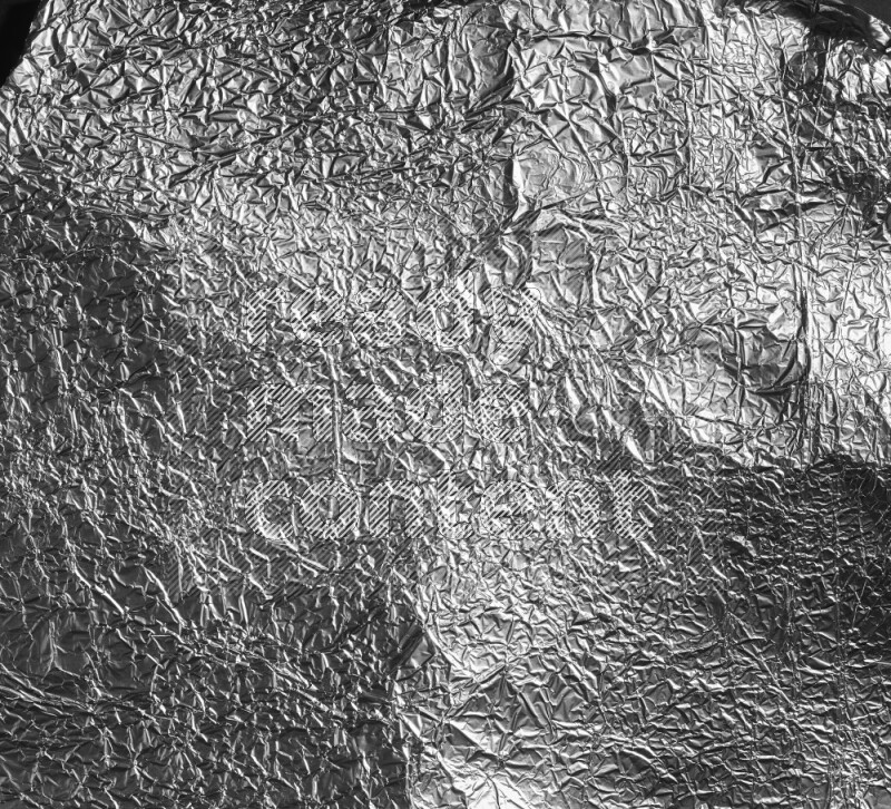 Aluminium foil on black background