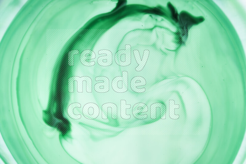 لقطة مقربة لأنماط دوامية بتدرجات اللون الأخضر