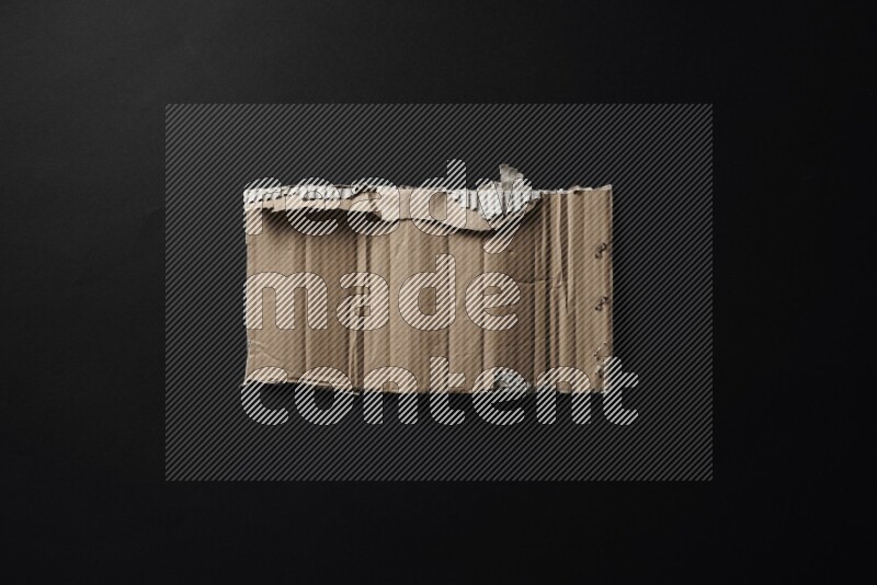 Cardboard on black background