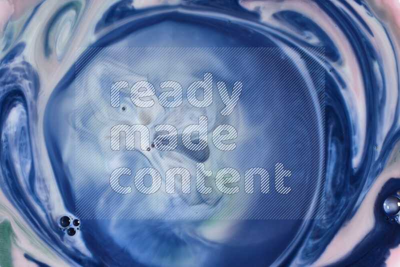 لقطة مقربة لأنماط دوامية باللون الأزرق والأبيض