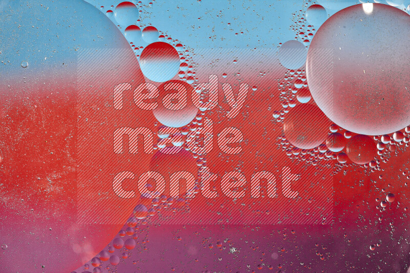 Close-ups of abstract oil bubbles on water surface in shades of blue, red and purple