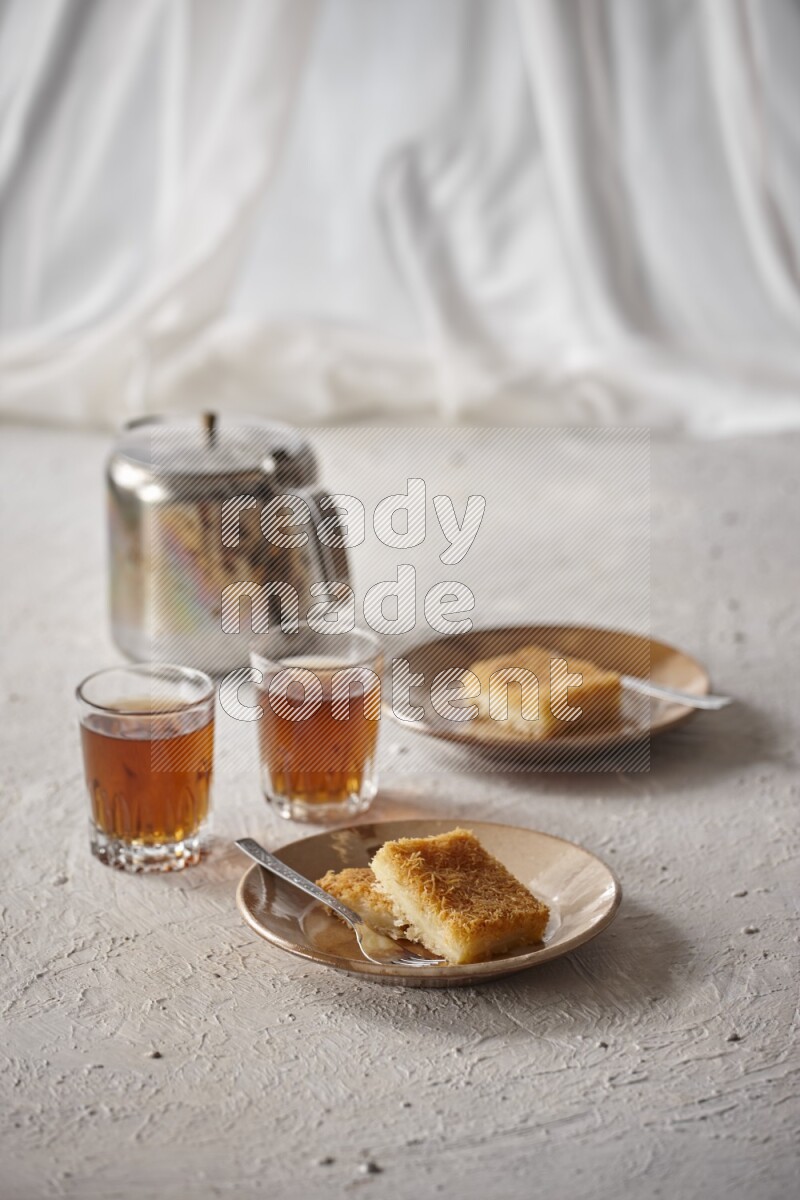 Konafa with tea in a light setup