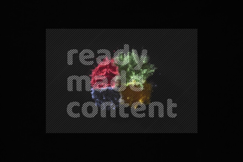 Colorful powder explosion on black background
