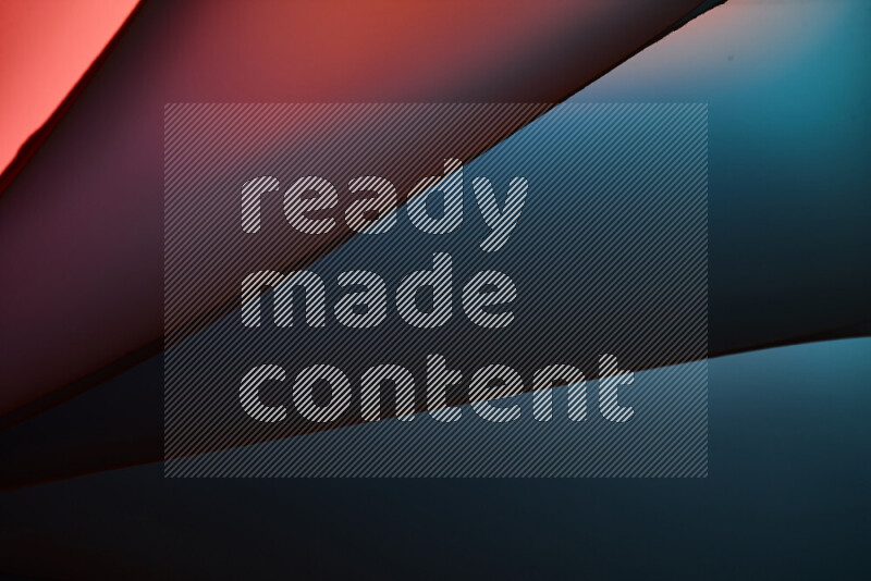 فن تجريدي يعرض منحنيات مع تدرجات الألوان الدافئة والباردة مكونه بضوء ملون