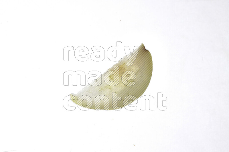 Pear slices on illuminated white background