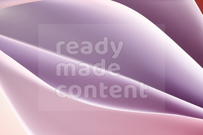 This image showcases an abstract paper art composition with paper curves in white and different warm gradients created by colored light