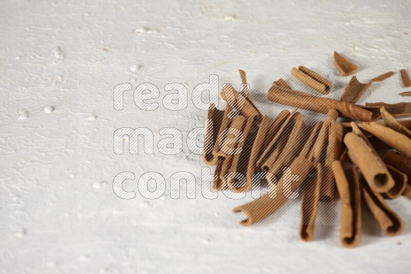 Cinnamon sticks in different angles on white background