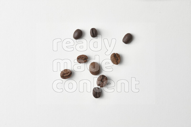 Roasted coffee beans on white background
