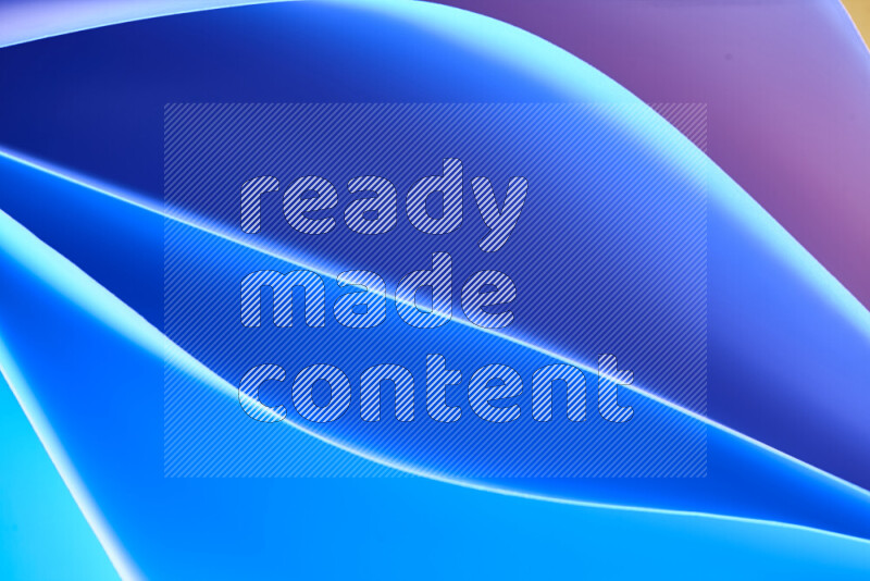 هذه الصورة تعرض تكوين فن الورق التجريدي مع منحنيات ورقية بتدرجات اللون الأزرق والارجواني والوردي المكونه بواسطة الضوء الملون