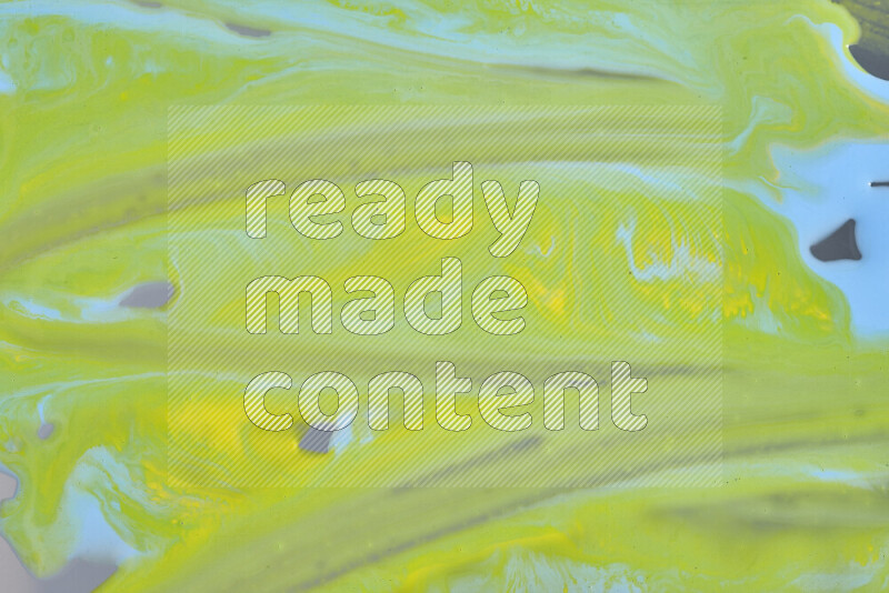 Abstract colorful background with mixed of yellow and blue paint colors