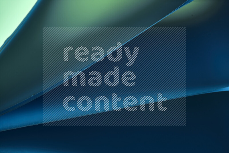 An abstract art piece displaying smooth curves in cold gradients created by colored light