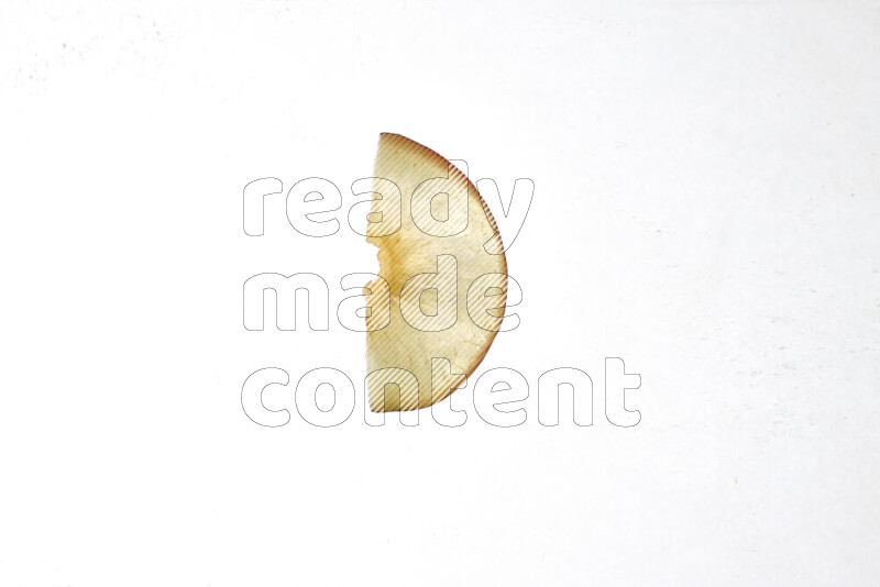 Peach slices on illuminated white background