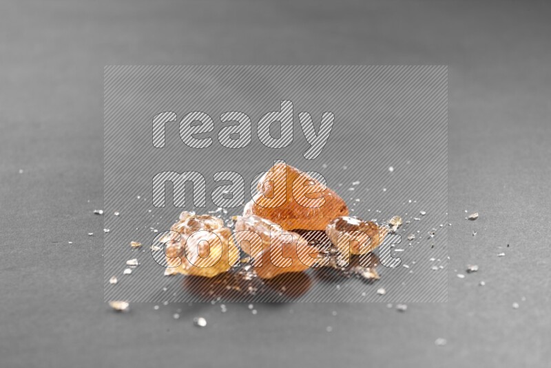 Gum arabic on a black flooring