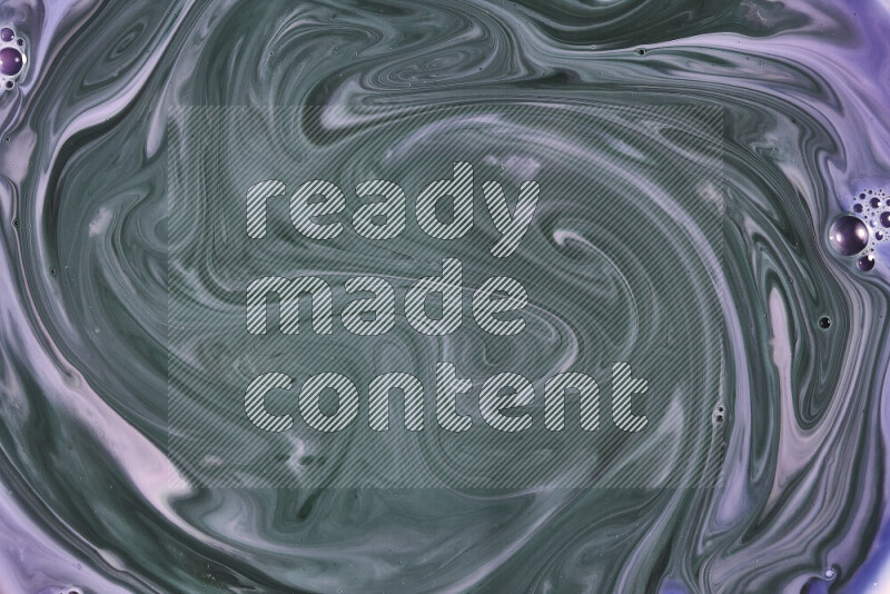 A close-up of abstract swirling patterns in blue, pink and green