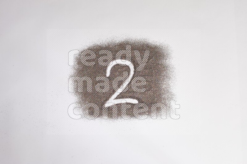 Numbers written with glitter on white background