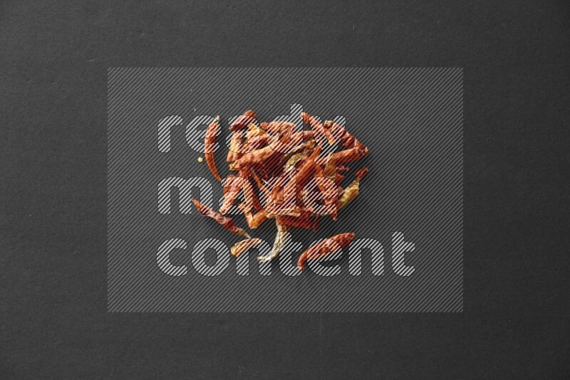 Chili pepper on a black flooring