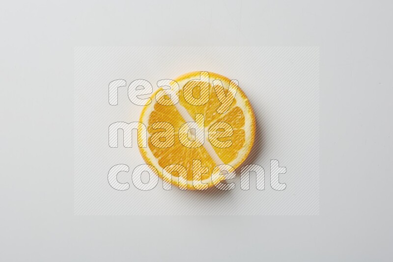 Two halves of an orange slices on white background