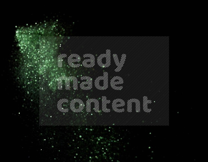Green glitter powder isolated on black background