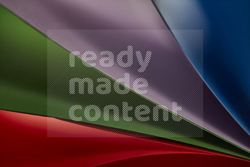 An abstract art showing colorful paper sheets arranged in an overlapping curves