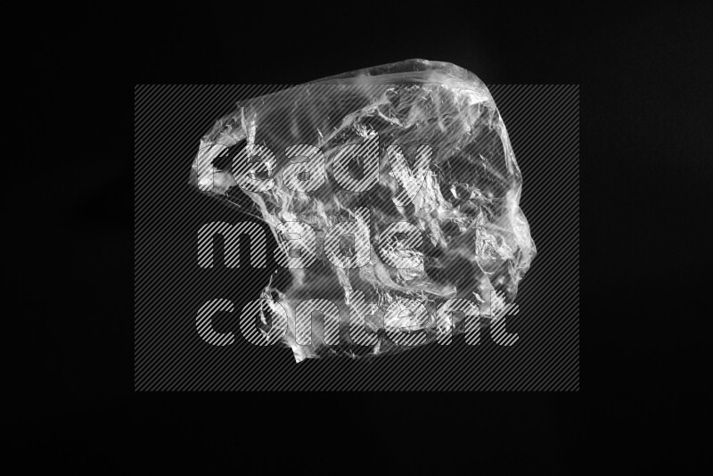Transparent plastic textures on black background