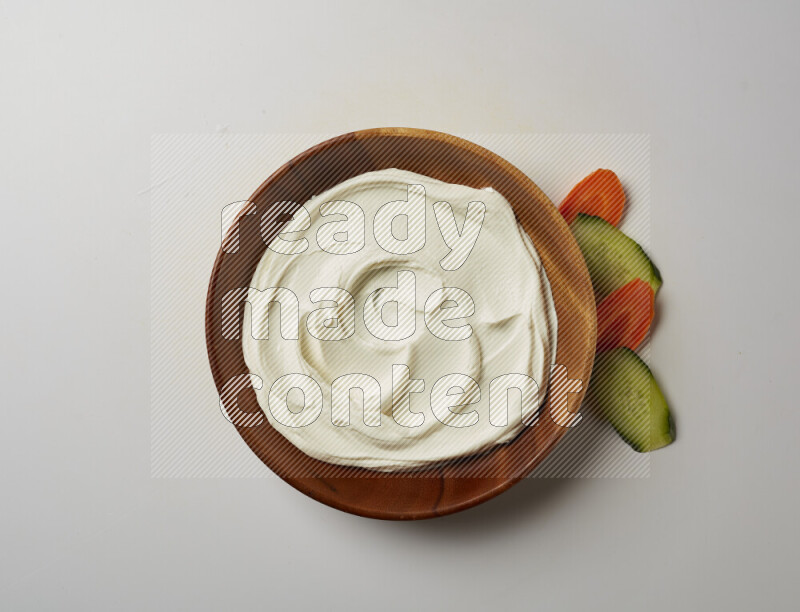 Plain Lebnah in a wooden plate on a white background