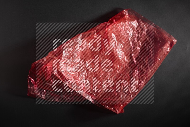 Colored plastic textures on black background