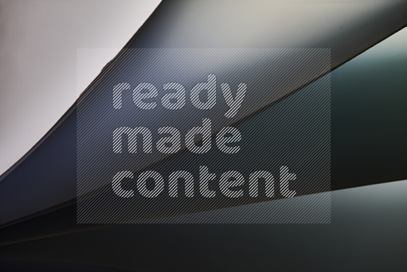 An abstract art piece displaying smooth curves in cold gradients created by colored light