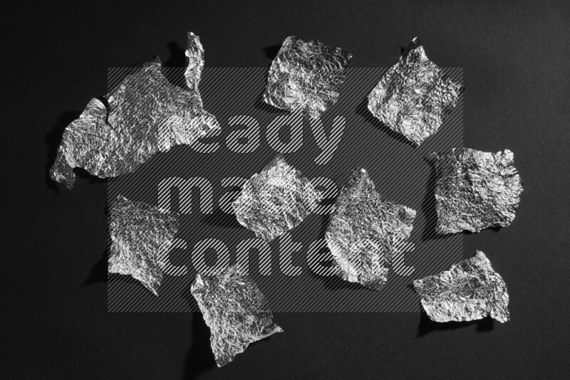 Aluminium foil on black background