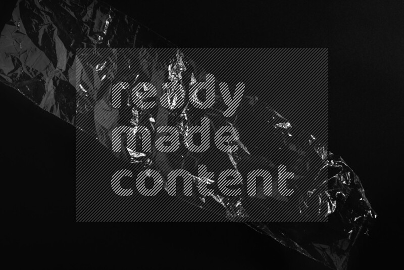 Transparent plastic textures on black background