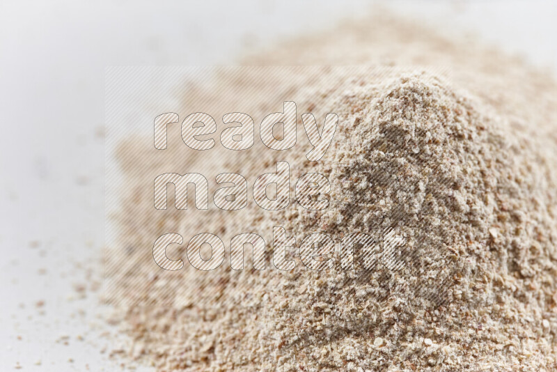 A bunch of onion powder on white background