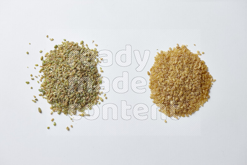 Coarse bulgur with freekeh on white background