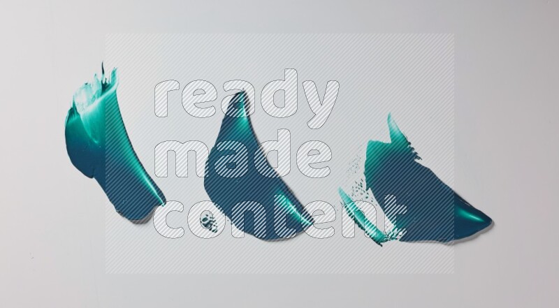 Turquoise painting knife strokes on white background