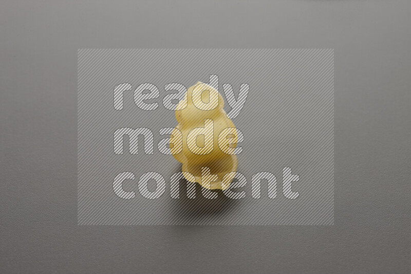 Snails pasta on grey background