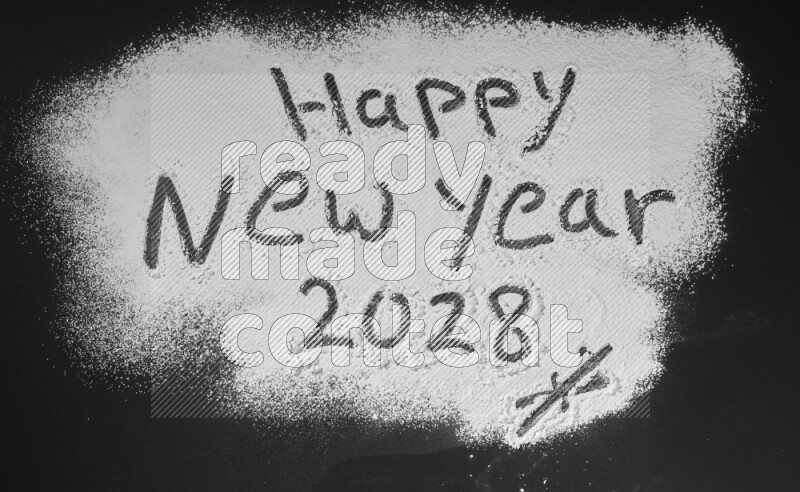 A sentence written with powder on black background