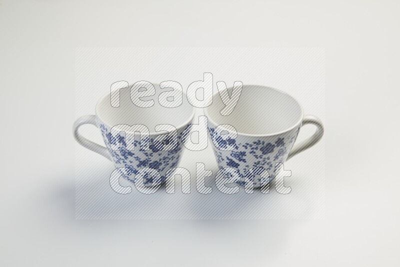 white and blue mug on white background